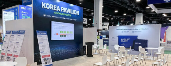 Korea Pavilion trade show booth showcasing AI semiconductor technology with seating and digital displays.