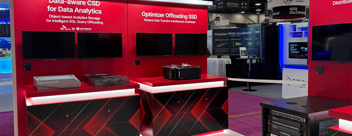 Custom red trade show booth with LED lighting and product displays