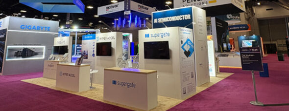 Trade show island booth with branded product stations and overhead signage