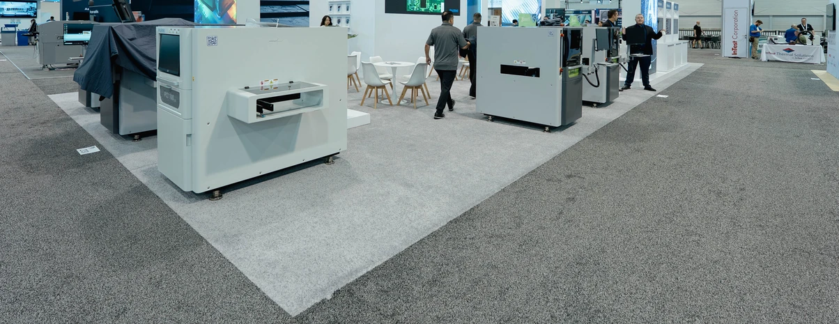Modern trade show booth with sleek custom flooring