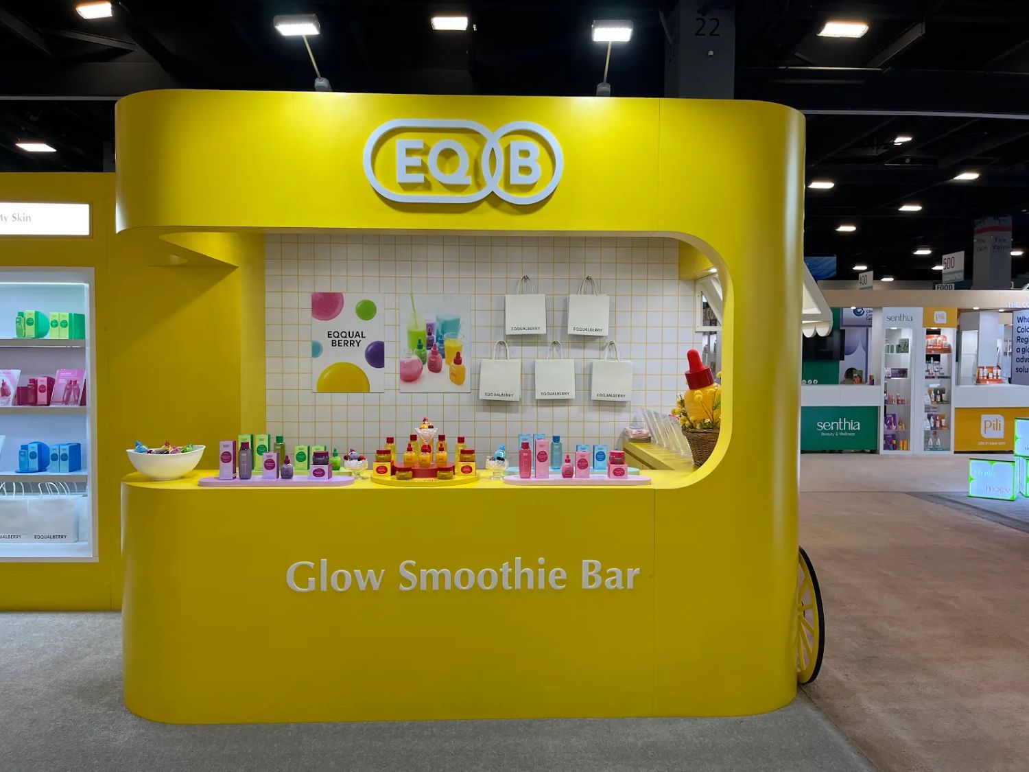 Glow Smoothie Bar counter on the Eqqualberry booth at Cosmoprof Miami