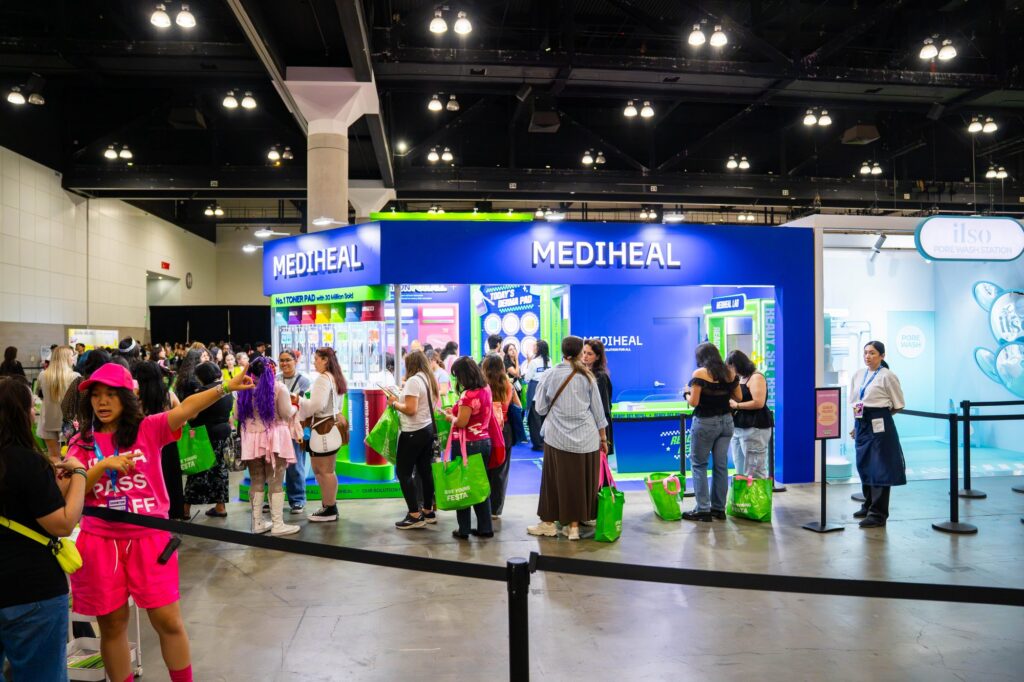 MEDIHEAL blue brand booth with attendees in line at Olive Young Festa KCON LA 2026