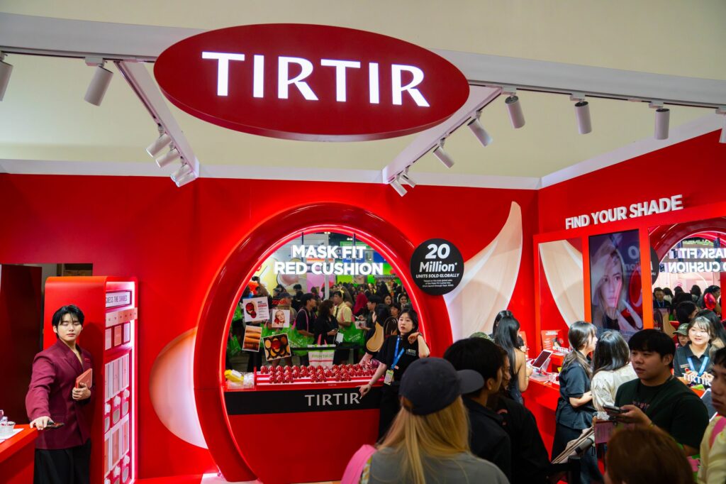 TIRTIR Mask Fit Red Cushion booth with oval red archway and Find Your Shade wall at KCON LA 2026