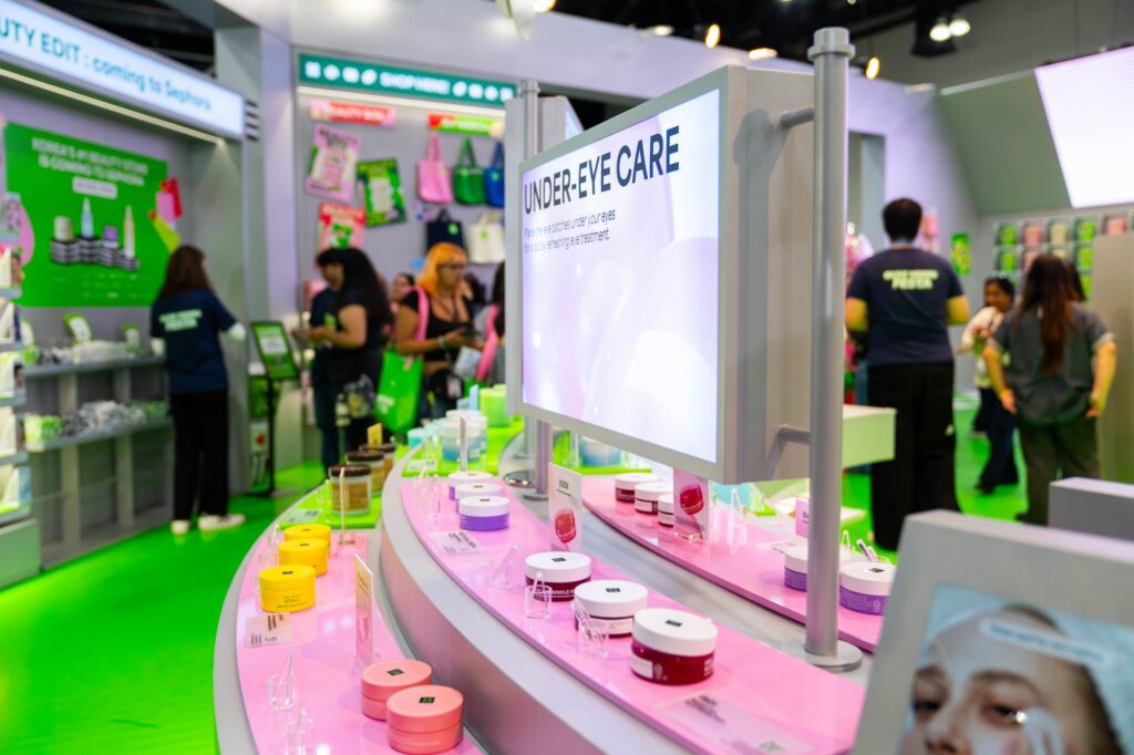 Under-Eye Care curved product display with digital screen in the Olive Young Festa store