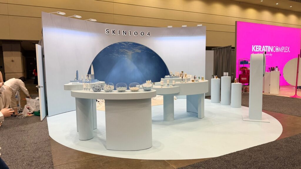 SKIN1004 product table with column pedestals