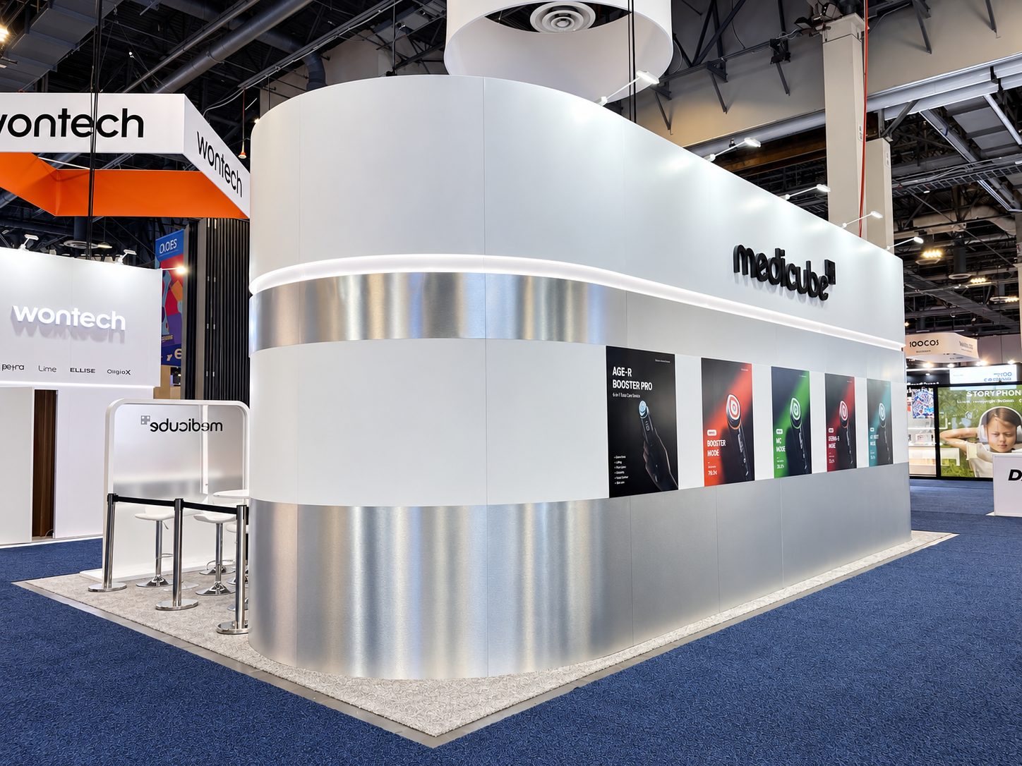 Side wall of the Medicube booth with product graphics at CES 2026